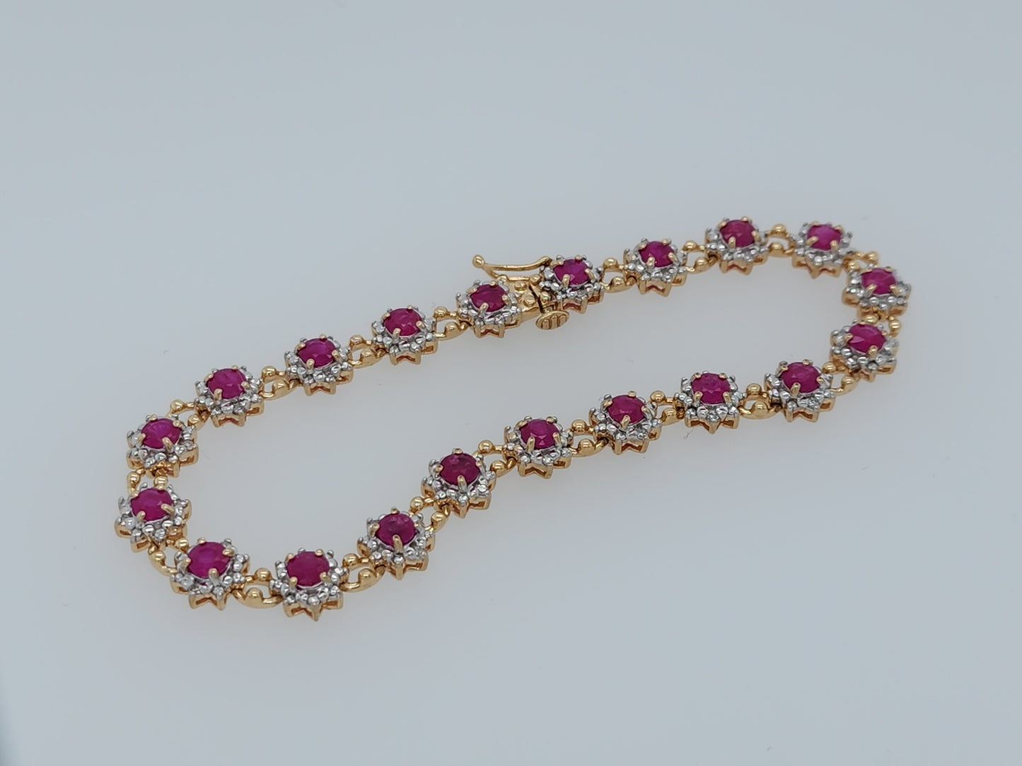 Ladies Flower Motif Ruby and Diamond Tennis Bracelet in 14k Yellow Gold