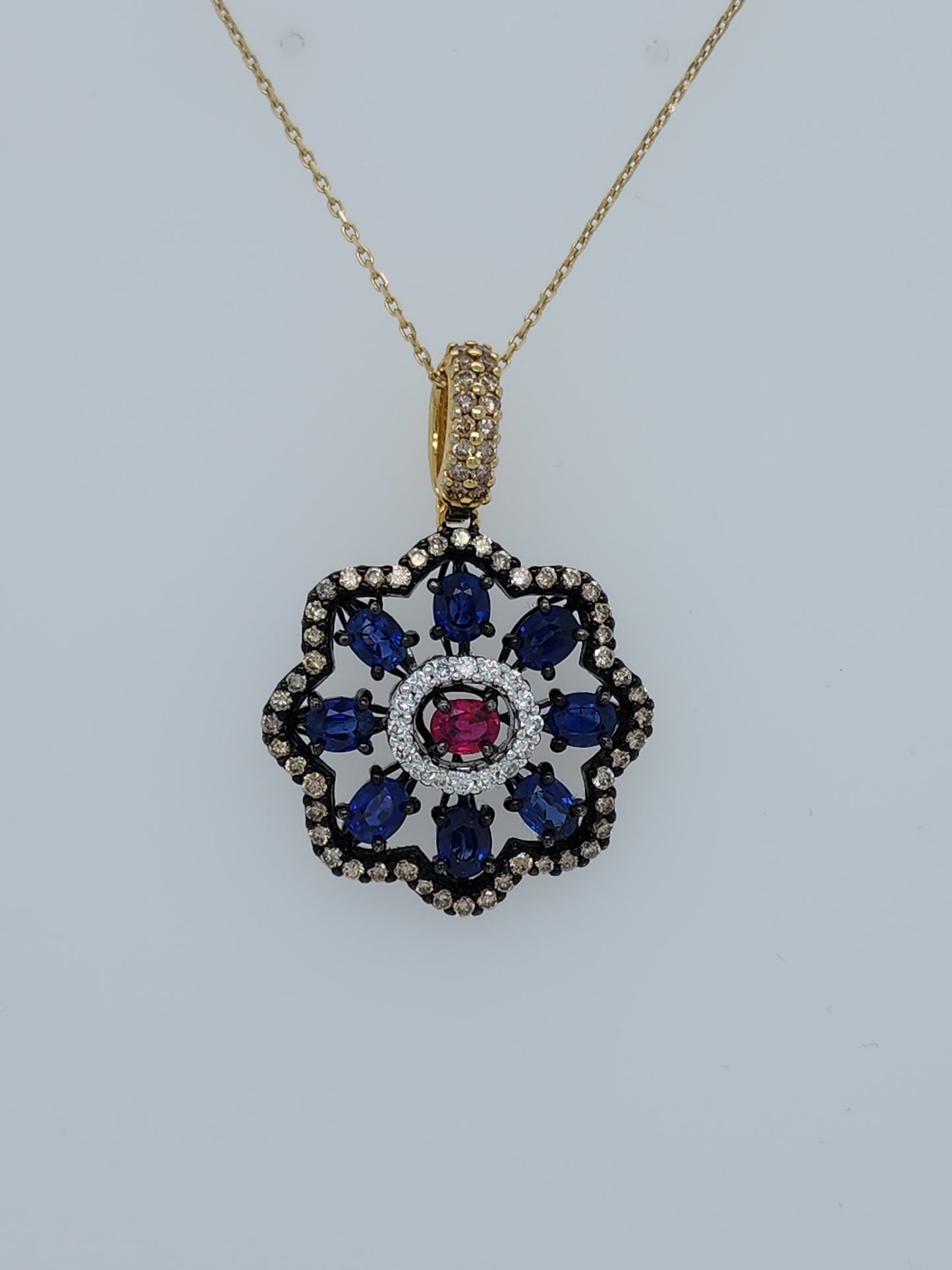 Unique Floral Motif Pendant with High Quality Sapphire, Ruby, White and Champagne Diamonds in 18k Gold and Black Rhodium