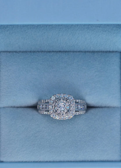 10k white gold diamond engagement ring with cushion-shaped double halo and three-row shank, 1 carat total diamond weight, size 7, cluster setting.