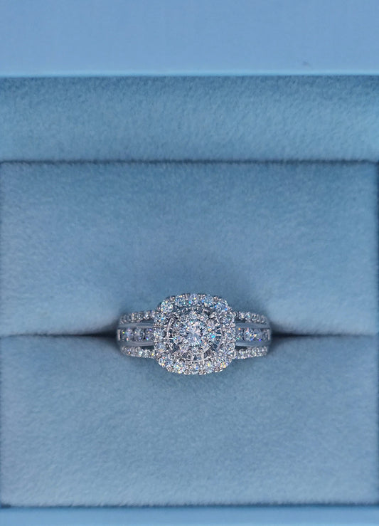 10k white gold diamond engagement ring with cushion-shaped double halo and three-row shank, 1 carat total diamond weight, size 7, cluster setting.