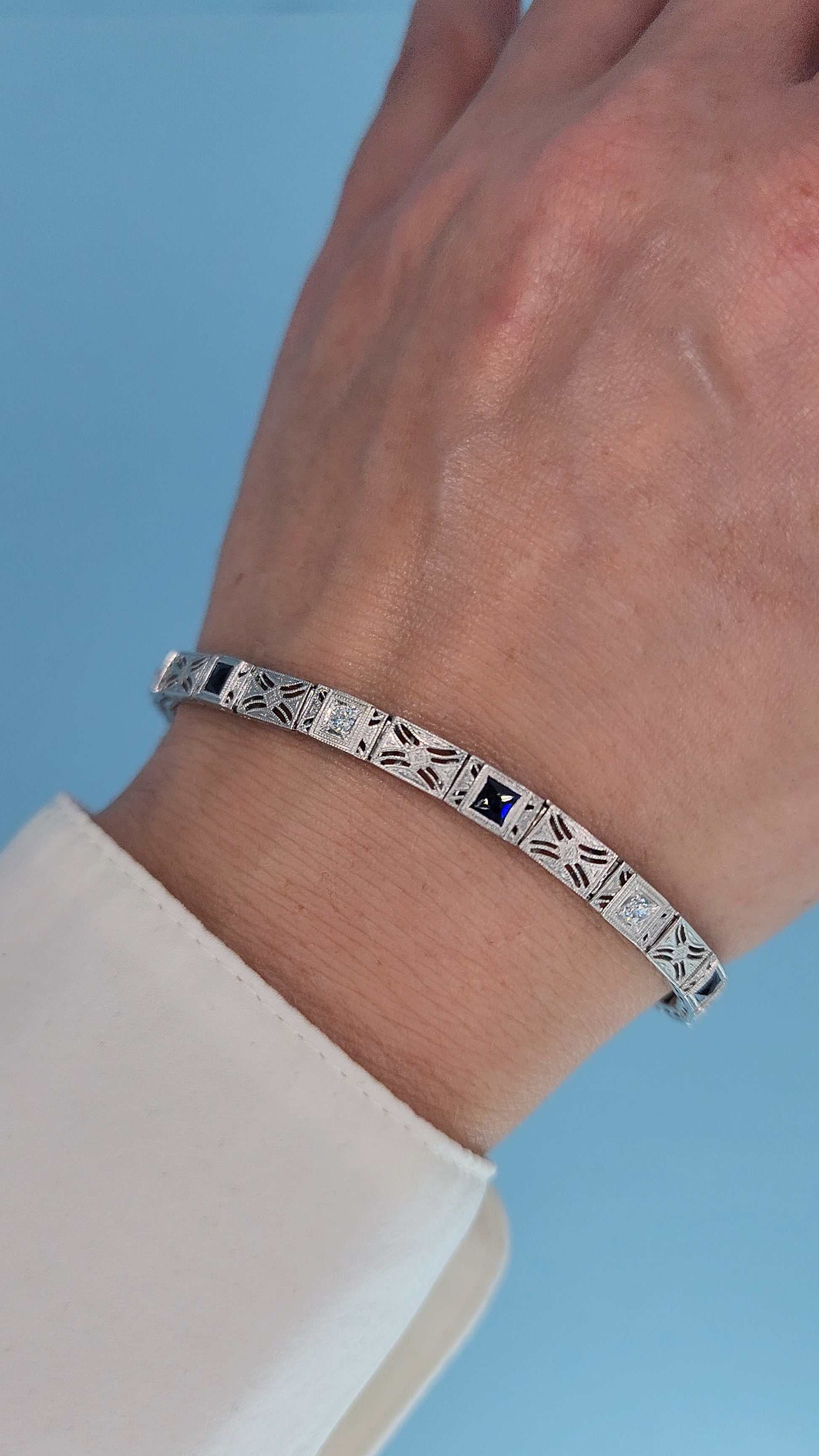 Art Deco 14k White Gold Bracelet with Princess-Cut Sapphires and Diamonds View on the Hand