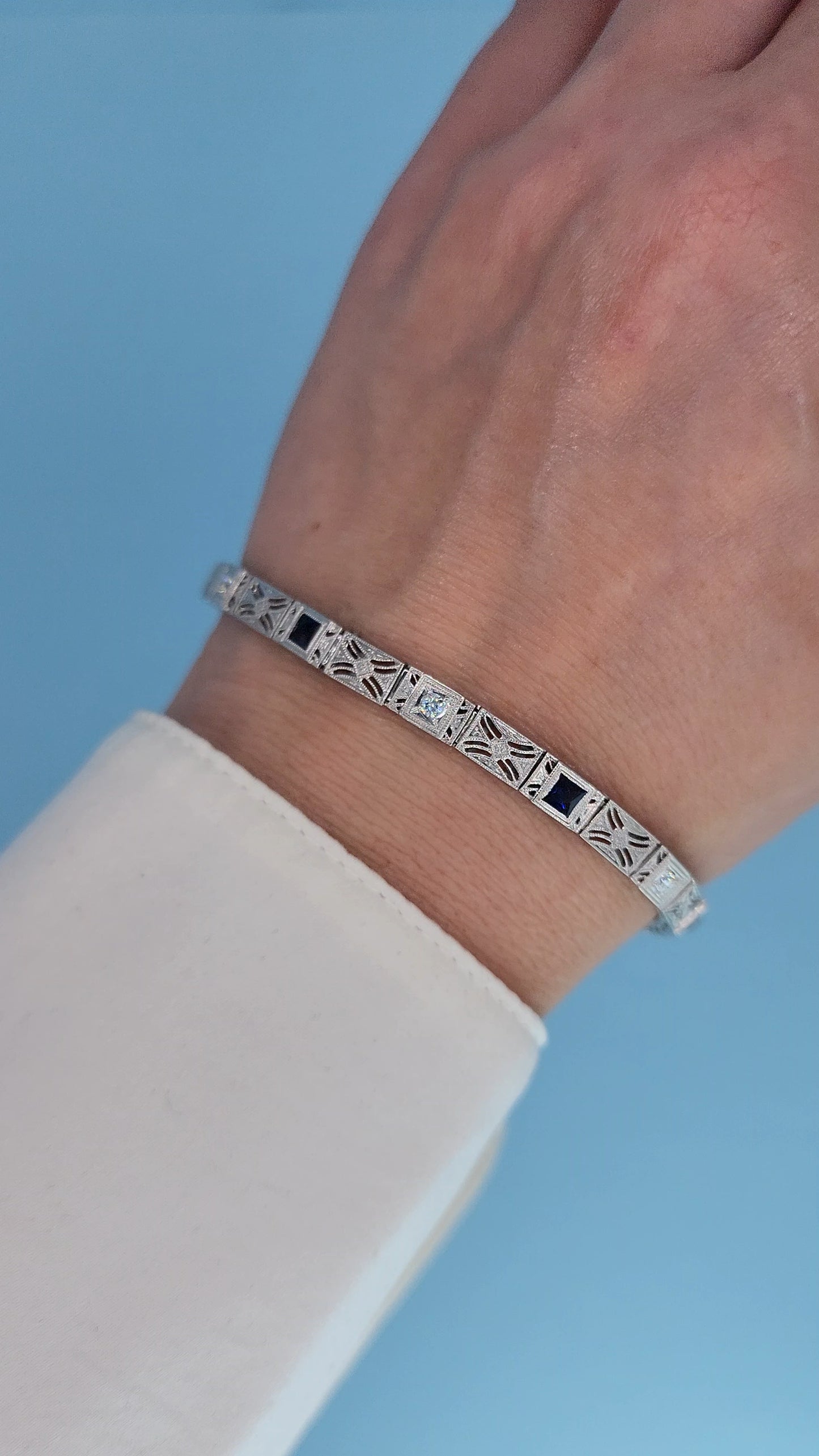 Art Deco 14k White Gold Bracelet with Princess-Cut Sapphires and Diamonds on the Hand