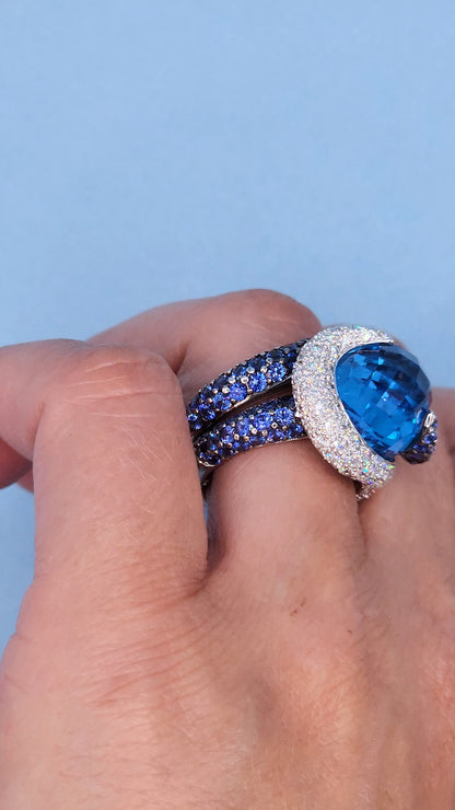 Large Cocktail Ring with Blue Topaz Center Accented by Diamond and Sapphire Swirl in 18k White Gold