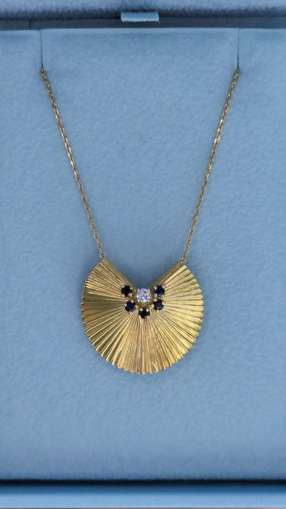 Modern Fan Pendant and Brooch in 18k Yellow Gold with Diamond and Sapphire Accents