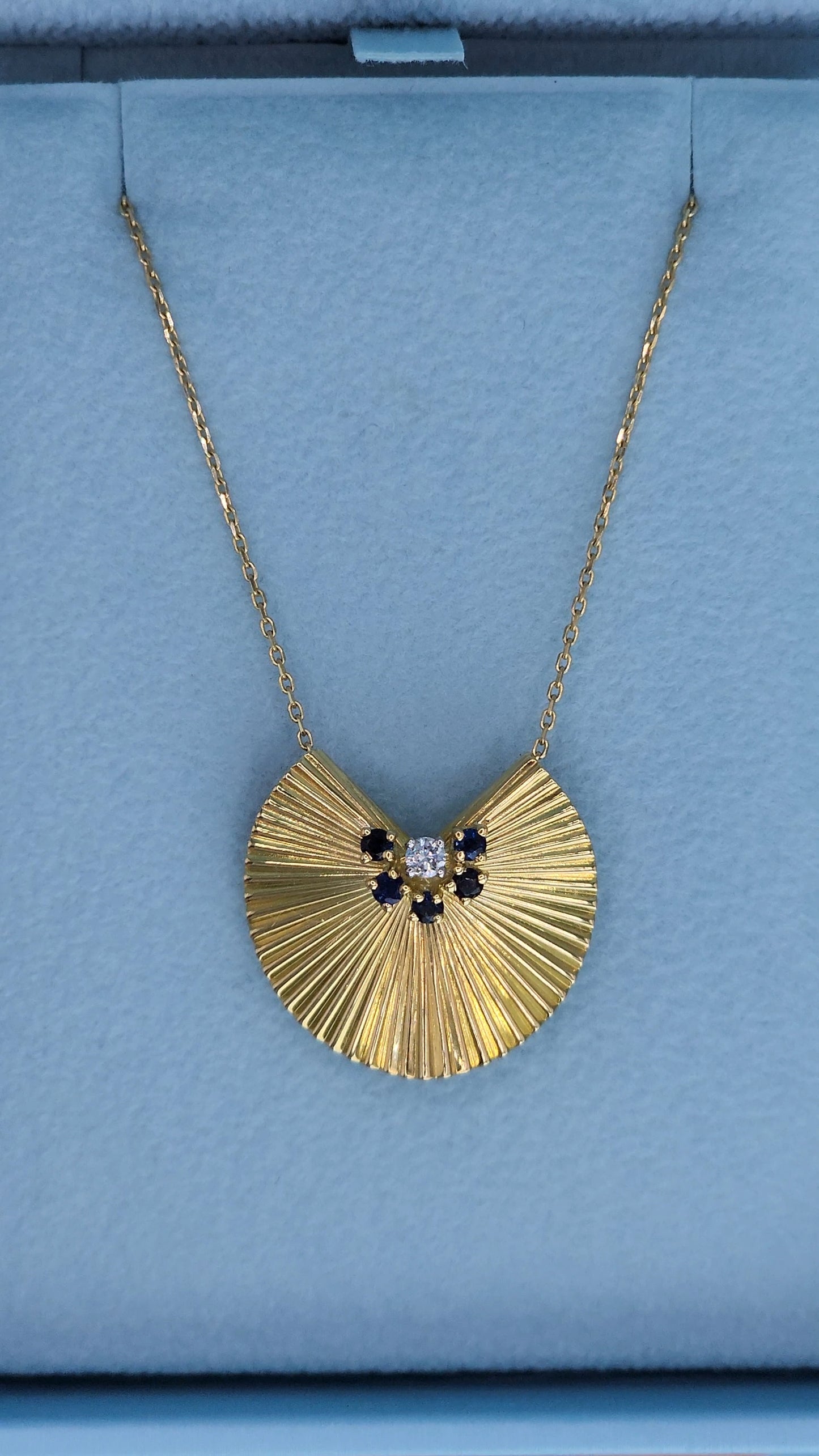 Modern Fan Pendant and Brooch in 18k Yellow Gold with Diamond and Sapphire Accents