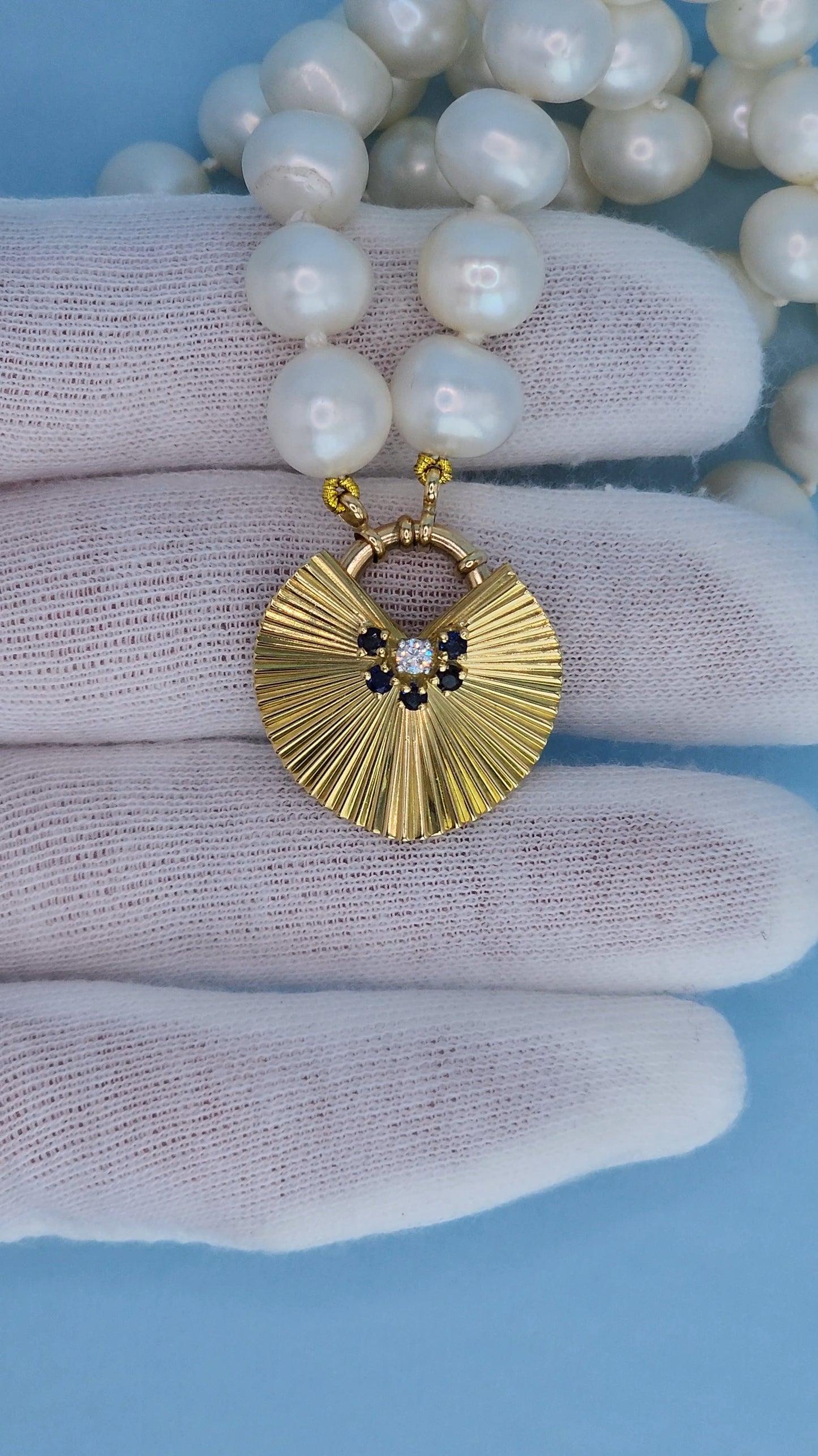 Modern Fan Pendant and Brooch in 18k Yellow Gold with Diamond and Sapphire Accents