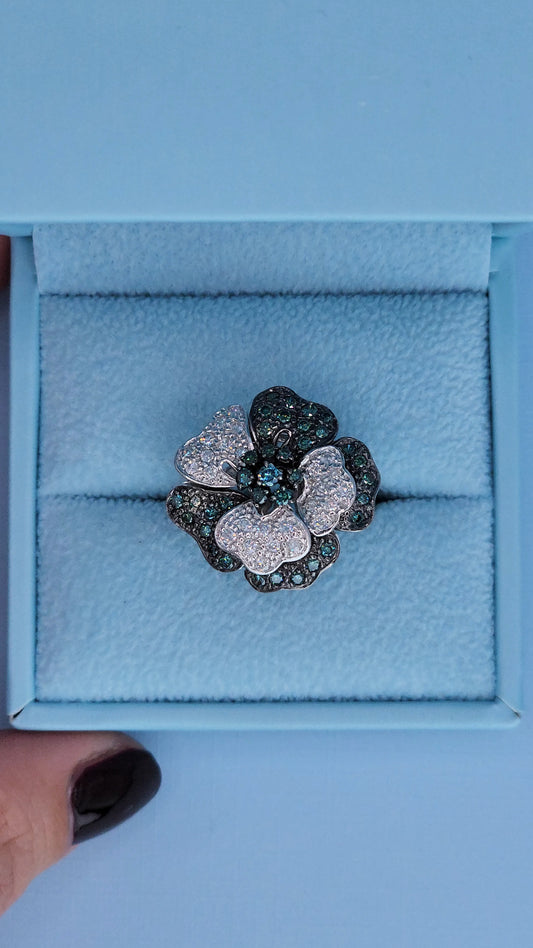 14k white gold diamond flower ring with blue and white diamonds and black rhodium accents