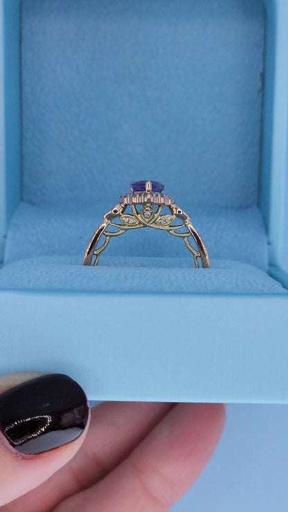 Side view showing yellow gold under-halo with diamonds and milgrain