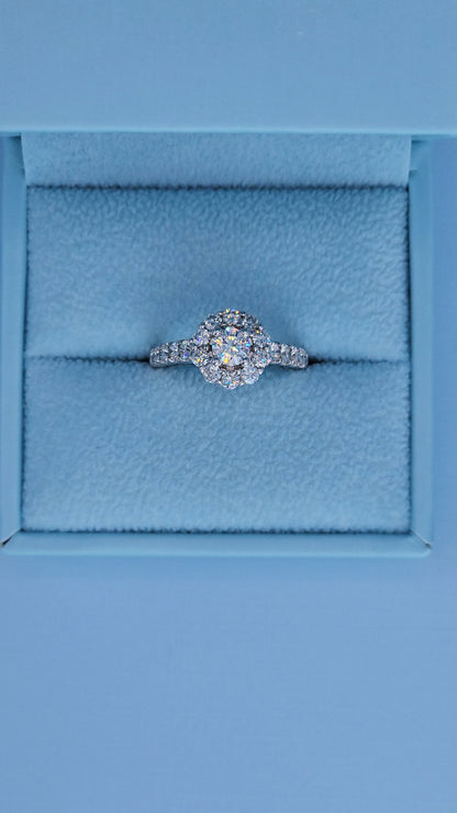 Diamond ring in a blue jewelry box