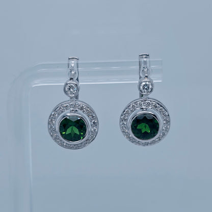 halo diamonds with diopside center drop earrings on white background